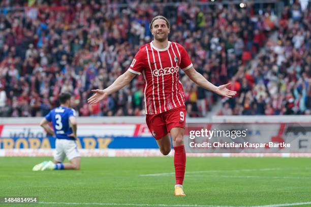 Lucas Hoeler of SC Freiburg celebrates after scoring his team’s third goal during the Bundesliga match between Sport-Club Freiburg and FC Schalke 04...