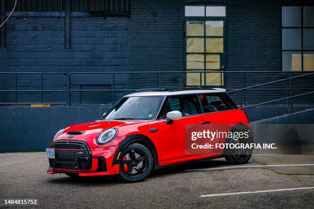 2023 mini cooper jcw on downtown parking lot - compact car stock pictures, royalty-free photos & images