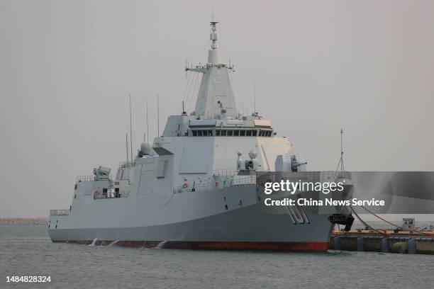 The Type 055 guided-missile destroyer Nanchang is seen at Qingdao Port ahead of an activity to celebrate the 74th anniversary of the founding of the...