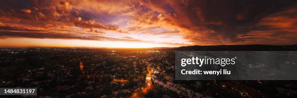 stunning sunset view of brisbane west suburb and mount coot-tha - dusk stock pictures, royalty-free photos & images