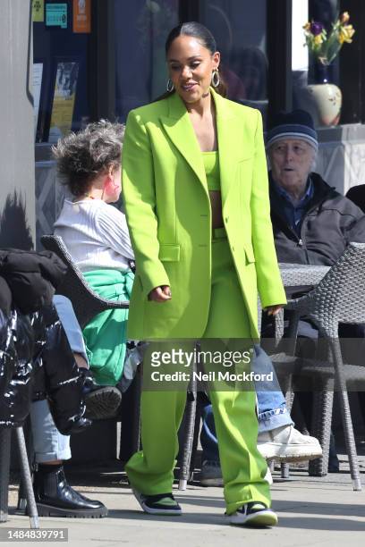 Alex Scott seen enjoying the sunshine and a drink with friends at the Prince of Wales pub in Primrose Hill on April 17, 2023 in London, England.