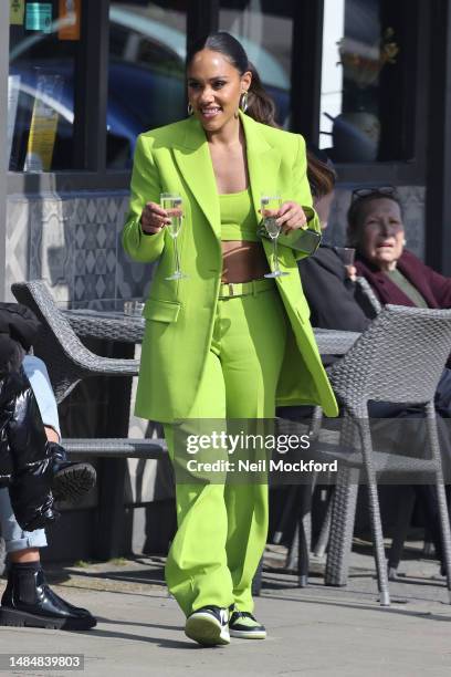 Alex Scott seen enjoying the sunshine and a drink with friends at the Prince of Wales pub in Primrose Hill on April 17, 2023 in London, England.