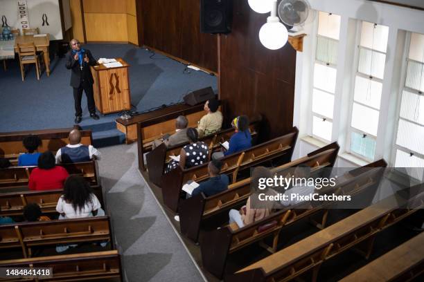 wide view from above church service - religious service stock pictures, royalty-free photos & images