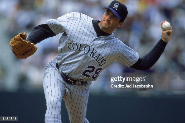 Mike Rokes Colorado Pitcher Mike Meyers of the Colorado Rockies throws a pitchduring the ...
