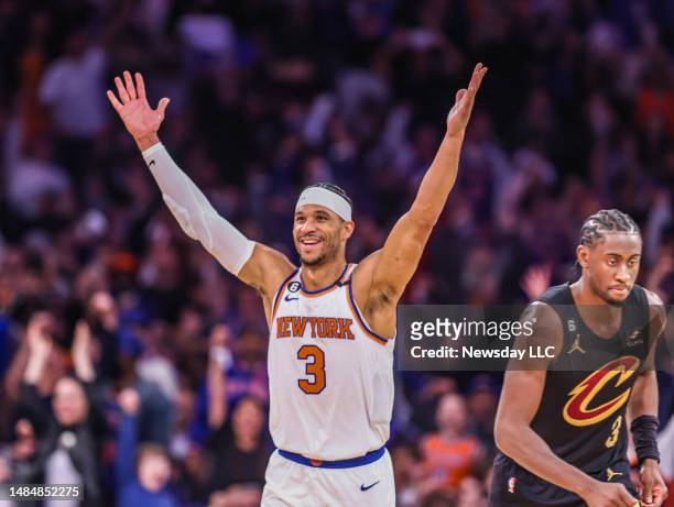 New York Knicks Josh Hart raises his arm after fighting for a score in the 4th quarter against the Cleveland Caverliers at Madison Square Garden in...