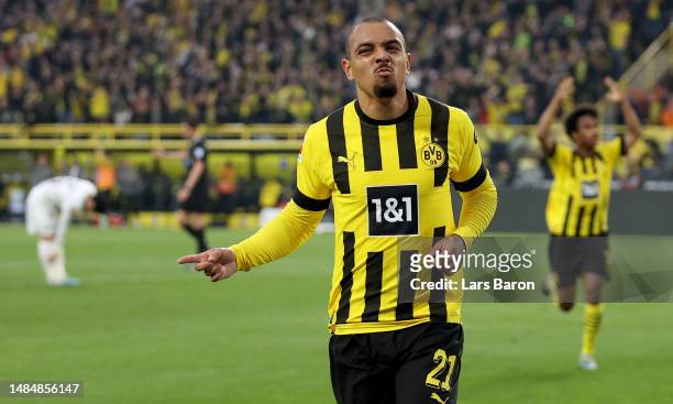 Donyell Malen of Dortmund celebrates after scoring his teams fourth goal during the Bundesliga match between Borussia Dortmund and Eintracht...