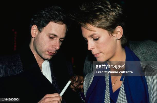Jamie Lee Curtis and partner - actor Christopher Guest attend an event, United States, circa 1990s.