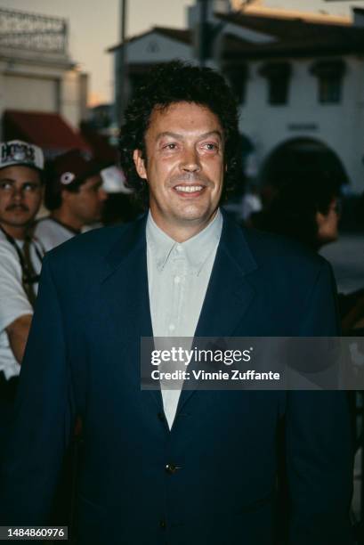 Tim Curry attends an event. United States, circa 1990s.