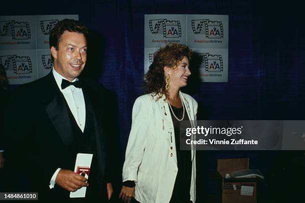Tim Curry and Annie Potts attend the American Cinema Awards, United States, circa 1990s.