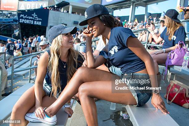 Miss Teen USA 2011 Danielle Doty and Miss Universe 2011 Leila Lopes attend the Toronto Blue Jays vs New York Yankees game at Yankee Stadium on July...