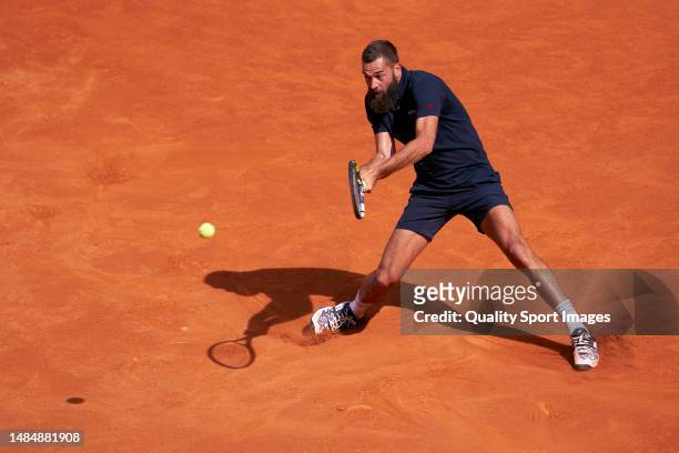 Benoit Paire of France returns the ball in their Men's Singles 1st Round Qualifying match against Francesco Passaro of Italy during day one of Mutua...