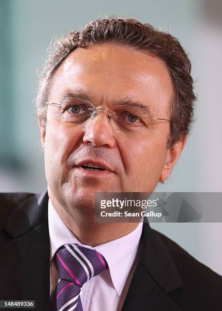 German Interior Minister Hans-Peter Friedrich arrives for the weekly German government cabinet meeting on July 18, 2012 in Berlin, Germany. The...