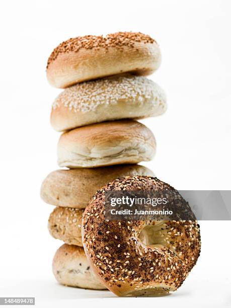 stack of assorted bagels - bagels stock pictures, royalty-free photos & images