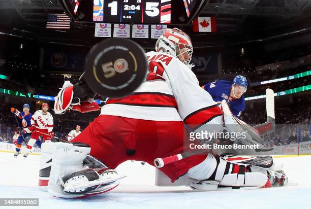 Bo Horvat of the New York Islanders scores a third period goal against Antti Raanta of the Carolina Hurricanes during Game Four in the First Round of...