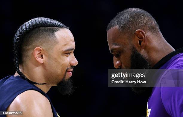 Dillon Brooks of the Memphis Grizzlies and LeBron James of the Los Angeles Lakers talk before Game Three of the Western Conference First Round...