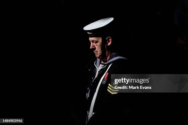 Serviceman stands with head bowed at the ANZAC Cenotaph during the ANZAC Dawn Service at the Martin Place Cenotaph on April 25, 2023 in Sydney,...