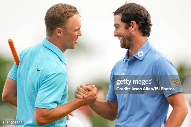 Nick Hardy and Davis Riley of the United States congratulate one another after their turn on the 18th green during the Final Round of the Zurich...