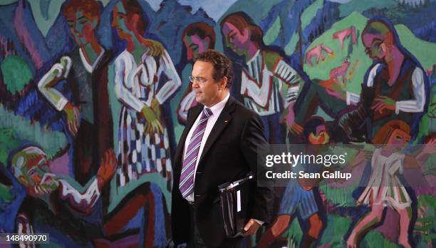 German Interior Minister Hans-Peter Friedrich arrives for the weekly German government cabinet meeting on July 18, 2012 in Berlin, Germany. The...