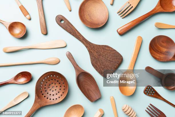 eco-friendly wooden kitchen utensils flat lay - wooden spoon stock pictures, royalty-free photos & images