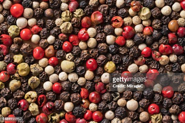 mixed peppercorns full frame view - ペッパー ストックフォトと画像