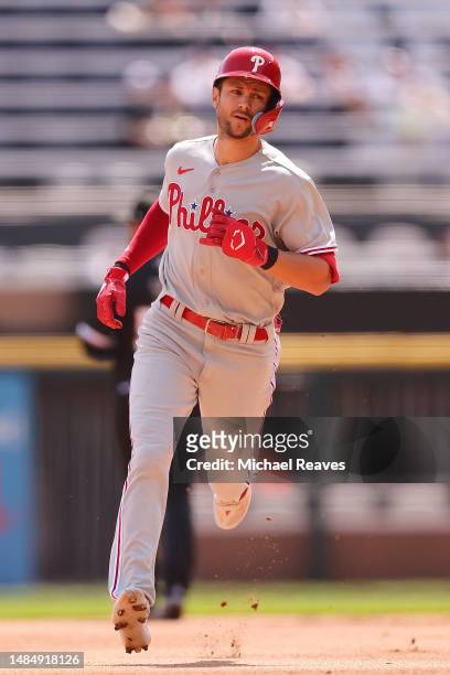Trea Turner of the Philadelphia Phillies rounds the bases after hitting a solo home run during the first inning against the Chicago White Sox at...