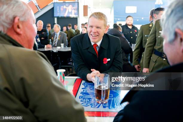 Prime Minister Chris Hipkins mingles at the Upper Hutt Cosmopolitan Club after attending dawn service on April 25, 2023 in Upper Hutt, New Zealand....