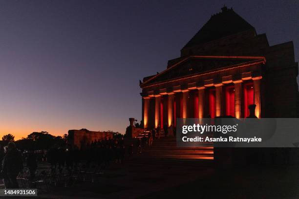 Dignitaries walk up the steps of the Shrine of Remembrance during the dawn service on April 25, 2023 in Melbourne, Australia. Anzac Day is a national...