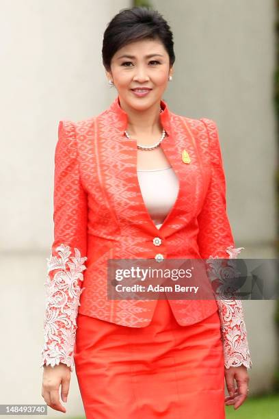 Thai Prime Minister Yingluck Shinawatra attends a military ceremony upon her arrival at the German federal chancellory on July 18, 2012 in Berlin,...