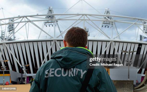 Security guard stands out side the Olympic Stadium at Olympic Park on July 18, 2012 in Stratford, London, England.