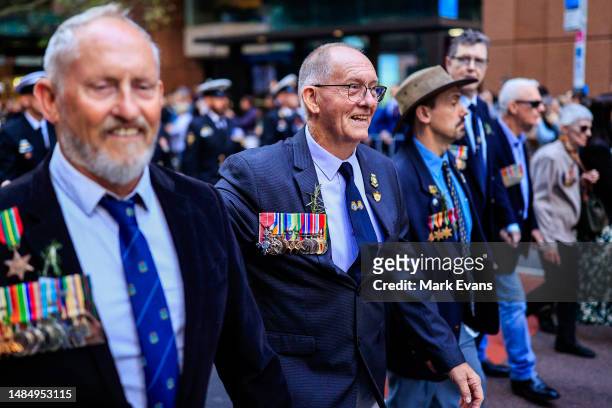 Veterans smile as they march during the ANZAC Day parade on April 25, 2023 in Sydney, Australia. Anzac Day is a national holiday in Australia,...