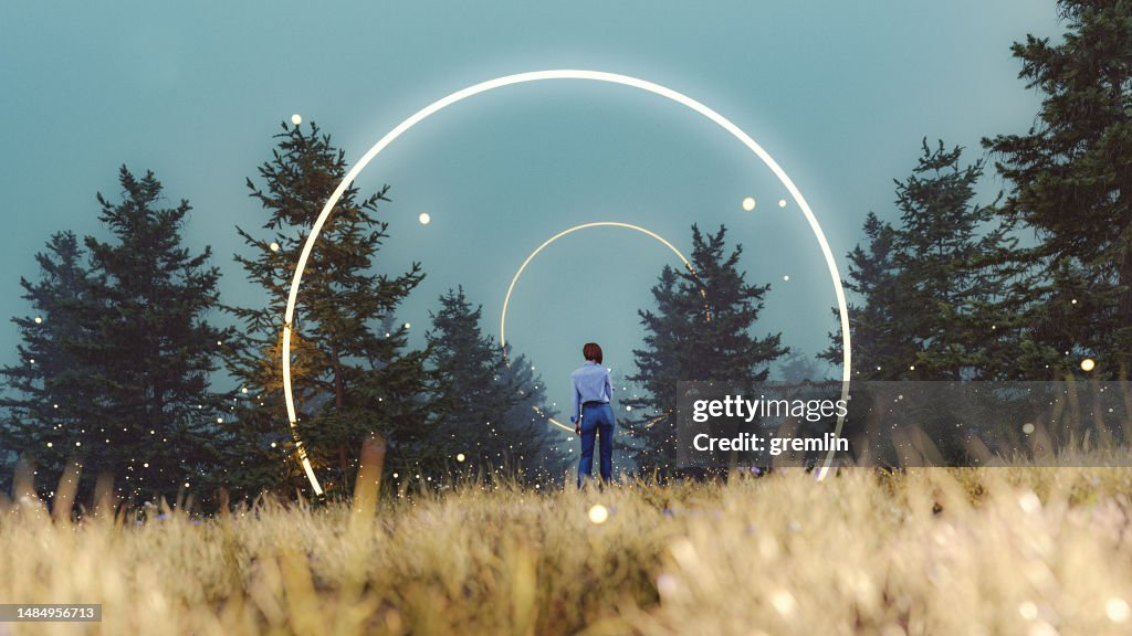 Fantasy landscape with woman walking towards mysterious circles