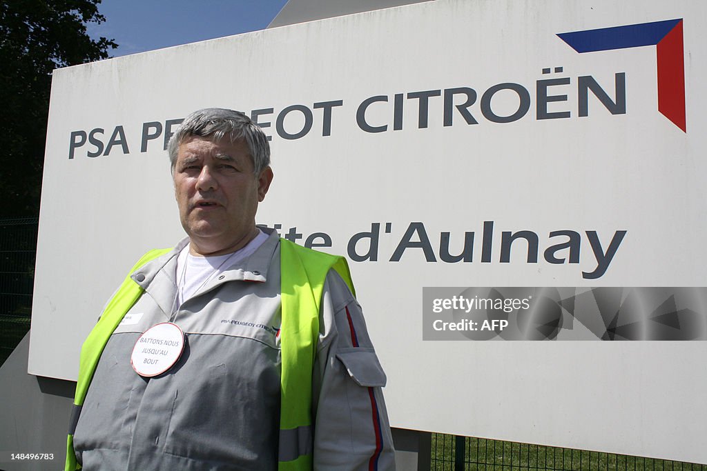 Worker of French carmaker PSA Peugeot Ci