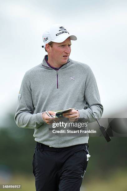Steven Tiley of England marks his card during the third practice round prior to the start of the 141st Open Championship at Royal Lytham & St Annes...