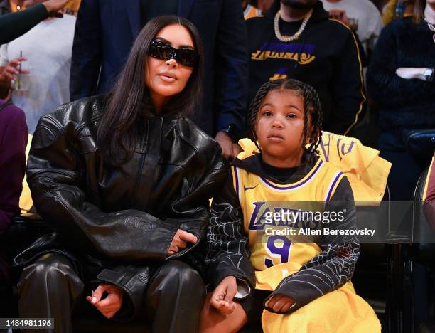 Kim Kardashian and Saint West attend a basketball game between the Los Angeles Lakers and the Memphis Grizzlies at Crypto.com Arena on April 24, 2023...