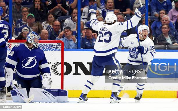Alexander Kerfoot of the Toronto Maple Leafs celebrates a goal in overtime to win Game Four of the First Round of the 2023 Stanley Cup Playoffs...