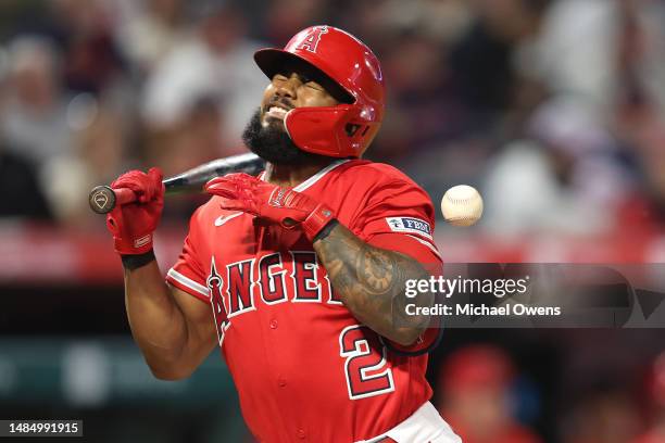 Luis Rengifo of the Los Angeles Angels is hit by a pitch from Ken Waldichuk of the Oakland Athletics during the fifth inning at Angel Stadium of...