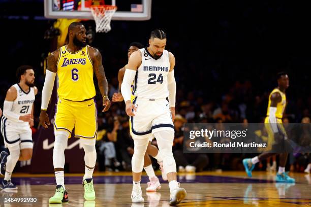 LeBron James of the Los Angeles Lakers and Dillon Brooks of the Memphis Grizzlies in the first half of Game Four of the Western Conference First...