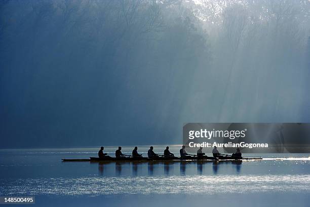 canoe team - leadership concepts stock pictures, royalty-free photos & images