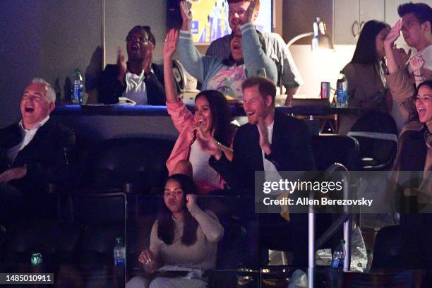 Prince Harry, Duke of Sussex and Meghan, Duchess of Sussex attend a basketball game between the Los Angeles Lakers and the Memphis Grizzlies at...
