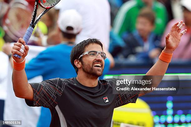 Janko Tipsarevic of Serbia celebrates victory after winning his finale match against Juan Monaco of Argentinia during day 6 of Mercedes Cup 2012 at...