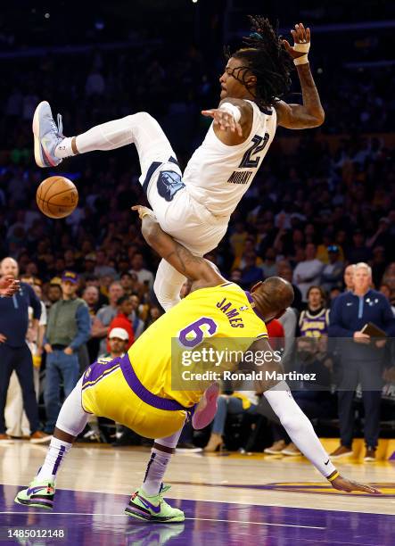 Ja Morant of the Memphis Grizzlies fouls LeBron James of the Los Angeles Lakers in the second half of Game Four of the Western Conference First Round...