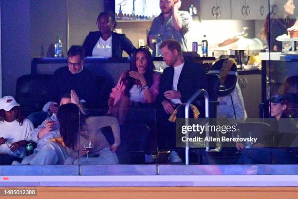 Prince Harry, Duke of Sussex and Meghan, Duchess of Sussex attend a basketball game between the Los Angeles Lakers and the Memphis Grizzlies at...