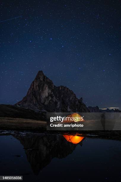 night with many stars in the mountains with tent at lake - the plough stock pictures, royalty-free photos & images