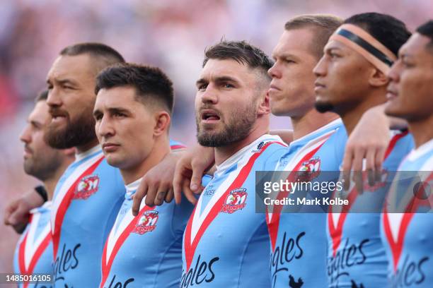 Angus Crichton of the Roosters pays his respect during the ANZAC Day ceremony prior to the round eight NRL match between Sydney Roosters and St...