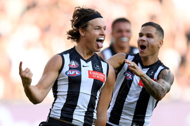 Jack Ginnivan of the Magpies celebrates kicking a goal during the round six AFL match between Collingwood Magpies and Essendon Bombers at Melbourne...