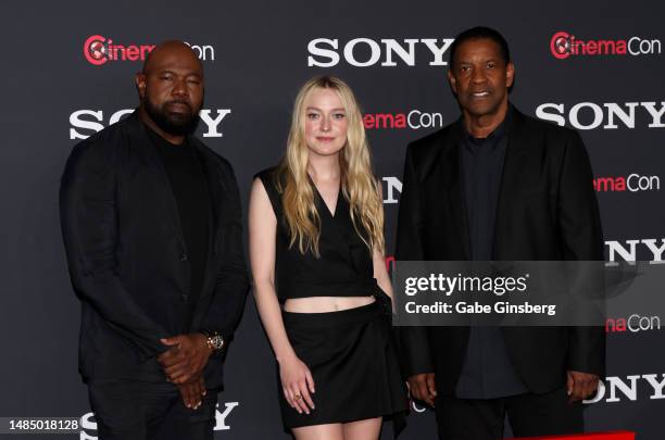 Antoine Fuqua, Dakota Fanning and Denzel Washington of "The Equalizer 3" attend the Sony Pictures Entertainment presentation during CinemaCon, the...