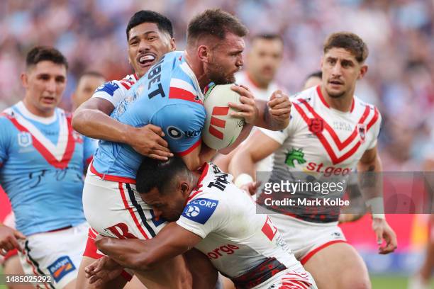 Angus Crichton of the Roosters is tackled during the round eight NRL match between Sydney Roosters and St George Illawarra Dragons at Allianz Stadium...