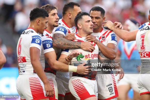 Jack Bird of the Dragons celebrates with team mates after scoring a try during the round eight NRL match between Sydney Roosters and St George...