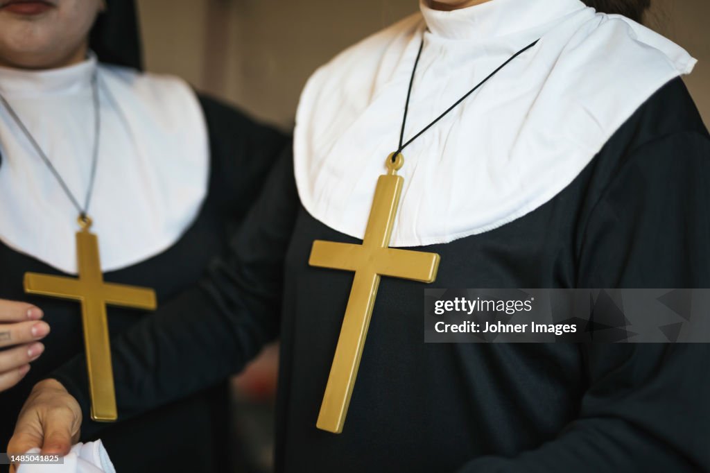 Two women dressed as nuns for Halloween