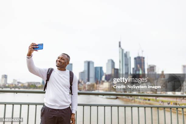 exploring frankfurt's majestic main river: a tourist's perspective. - frankfurt oder stock pictures, royalty-free photos & images